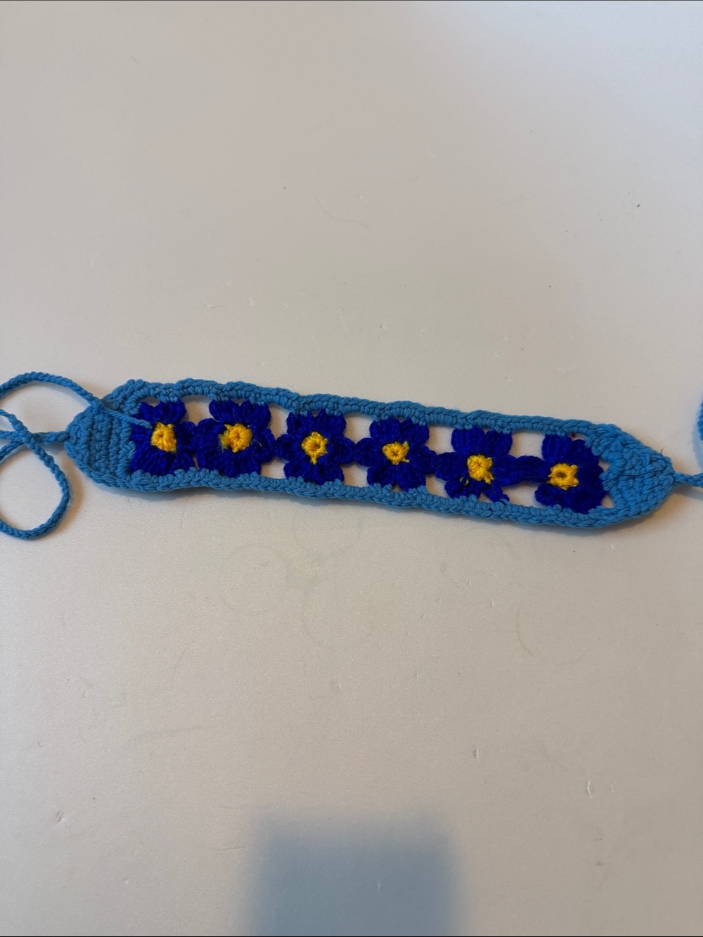 Handmade Blue Crochet Floral Headband with Yellow Accents